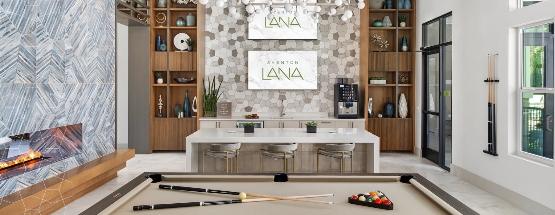 Aventon Lana's community game room with billiards table and chandelier
